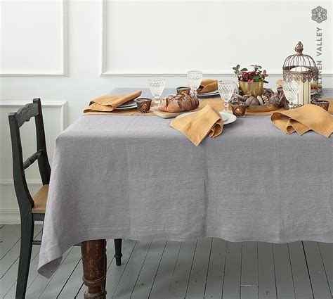 light gray tablecloth|More.